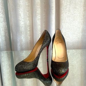 Christian Louboutin gold and black  fabric covered shoes
